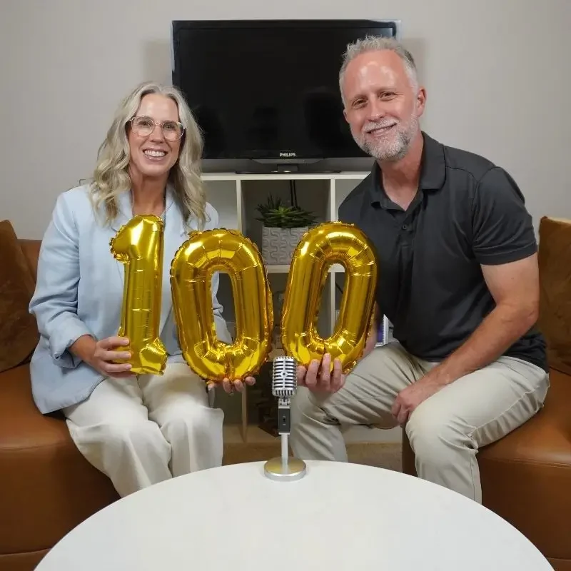 Rick and Clancy Denton holding 100 number ballons - 100 episodes of The Loud Quiet