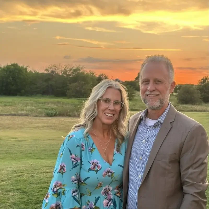 Authors Rick and Clancy Denton portrait with sunset
